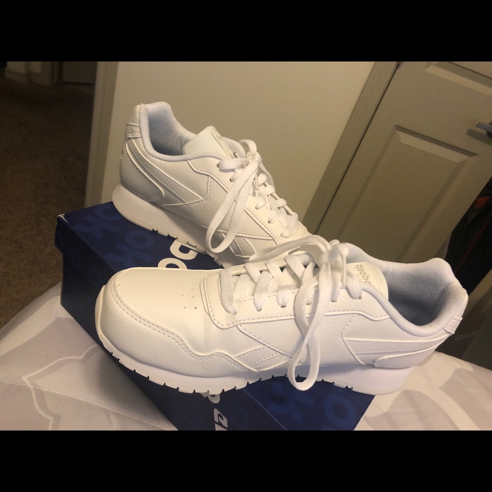 White Reebok Sneakers.